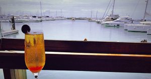 Cocktail on a boat over looking the pier | Gunther Kia