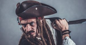 A pirate with dreads and a knife | Gunther Kia