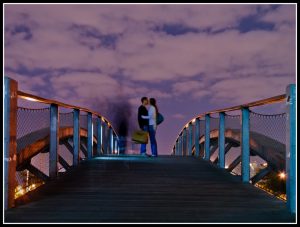 Romantic kiss on bridge - Ft Lauderdale Kia Dealer